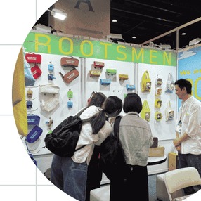 Buyers looking along the sample wall at the ROOTSMEN stand
